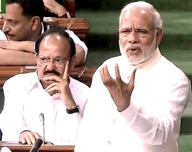 Prime Minister Narendra Modi speaks in Lok Sabha on the second day of
Parliament’s Winter Session on Friday PTI