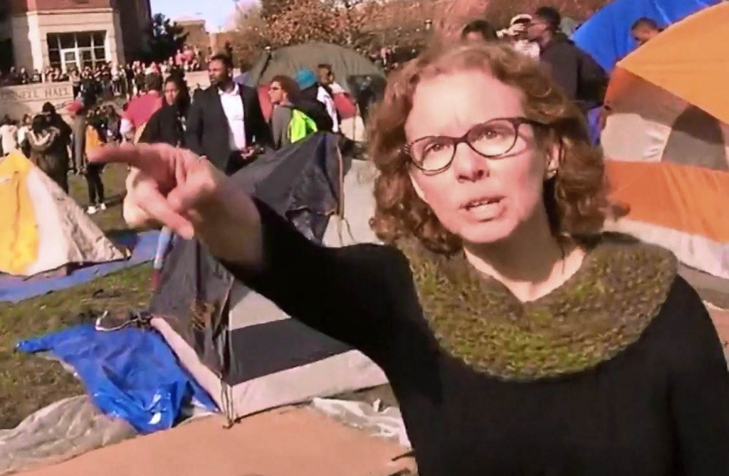 Professor Melissa Click tries to prevent a journalist from filming activists at the University of Missouri. Mark Schierbecker