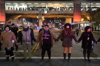 Protesters shut down a street in Chicago Wednesday during a protest over the death of 17-year-old Laquan McDonald