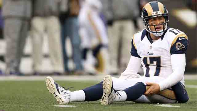 Quarterback Case Keenum #17 of the St. Louis Rams sits on the turf during a game against the Baltimore Ravens in the fourth quarter at M&T Bank Stadium