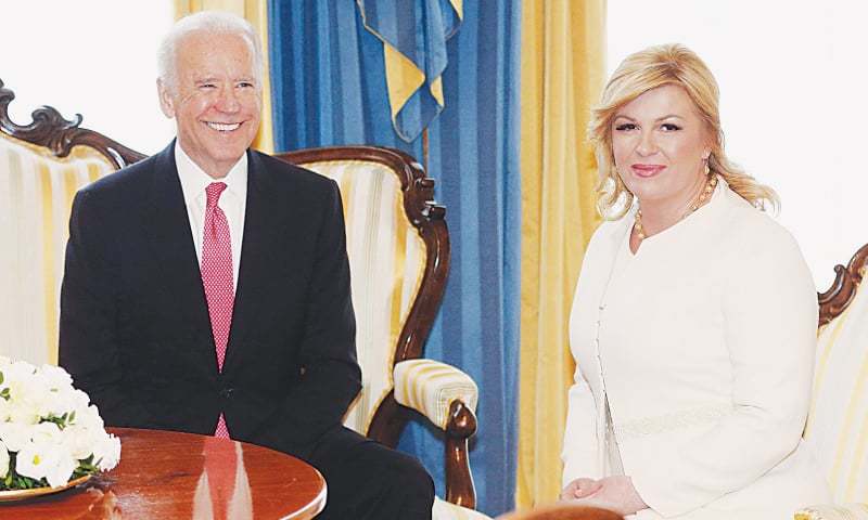 Zagreb: Croatian President Kolinda Grabar Kitarovic speaks to US Vice President Joe Biden at the start of a summit of countries that were once part of the former Yugoslavia.—AFP