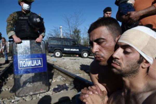 Migrants' Mouths Sewn Shut While Macedonia Border Stays Closed