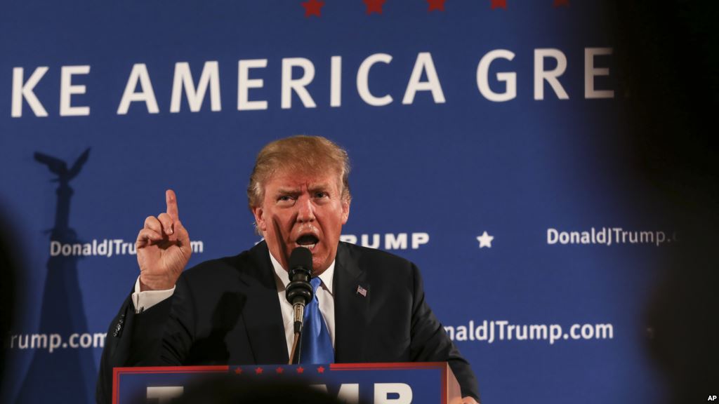 FILE- Republican presidential candidate Donald Trump gestures while speaking at a town hall meeting at Atkinson Country Club in Atkinson N.H. Oct. 26 2015