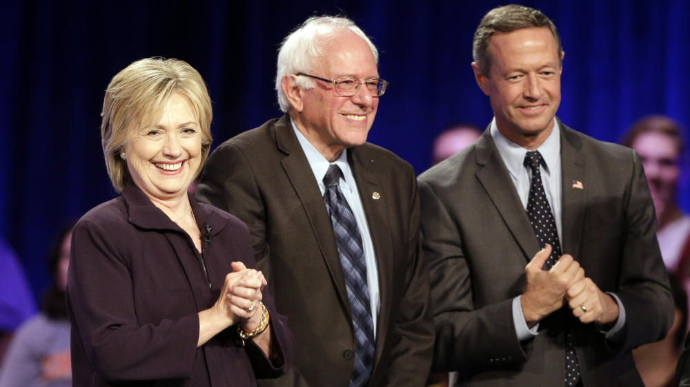 Hillary Clinton Bernie Sanders and Martin O'Malley take the stage after individually answering questions during Friday night's First In The South Democratic Presidential Forum at Winthrop University in Rock Hill S.C