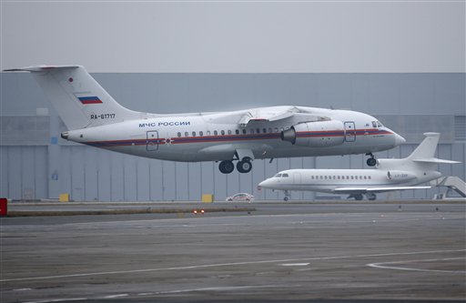 A Russian Ministry for Emergency Situations plane carrying the bodies of victims of a plane crash lands at Pulkovo airport outside St. Petersburg Russia Friday Nov. 6 2015. All 224 people onboard a Russian jet en route from the Red Sea resort of Shar