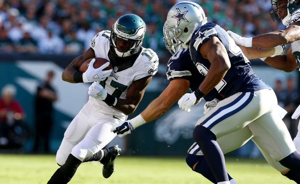 PHILADELPHIA PA- SEPTEMBER 20  Nelson Agholor #17 of the Philadelphia Eagles carries the ball as Barry Church #42 of the Dallas Cowboys defends in the first quarter