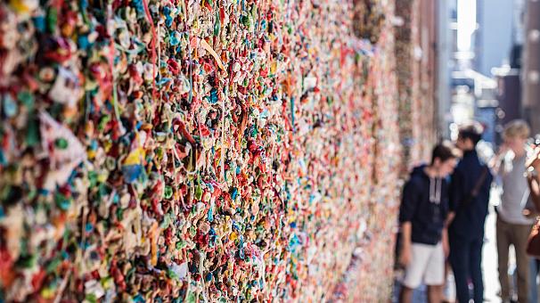 Seattle’s beloved but grungey gum wall gets wash after two decades