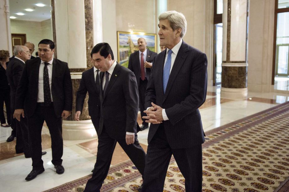 U.S. Secretary of State John Kerry right arrives for a meeting with Turkmenistan's President Gurbanguly Berdimuhamedov at the Oguzkhan Presidential Palace in Ashgabat Tuesday Nov. 3 2015