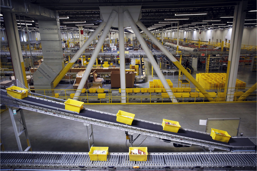 Slide 1  of 1		.		
		
			Caption
			A conveyor system at an Amazon Fulfilment Center in Tracy California. Robert Galbraith  Reuters  Corbis