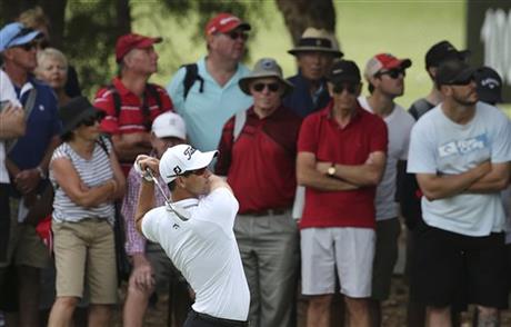 Adam Scott of Australia plays a fairway shot on the 7th hole during the Australia Open Golf Tournament in Sydney Australia Friday Nov. 27 2015