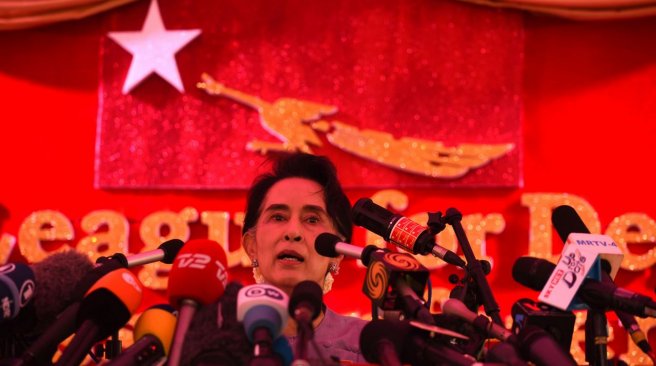 Myanmar opposition leader Aung San Suu Kyi and head of the National League for Democracy speaks at a press conference from her residential compund in Yangon