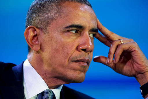 U.S. President Barack Obama listens closely during the APEC CEO Summit in Manila Philippines Nov. 18 2015