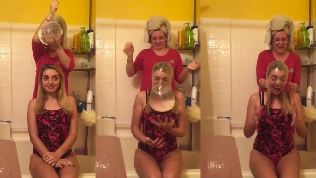 Hundreds of people have shared videos of themselves taking part in a'Condom Challenge