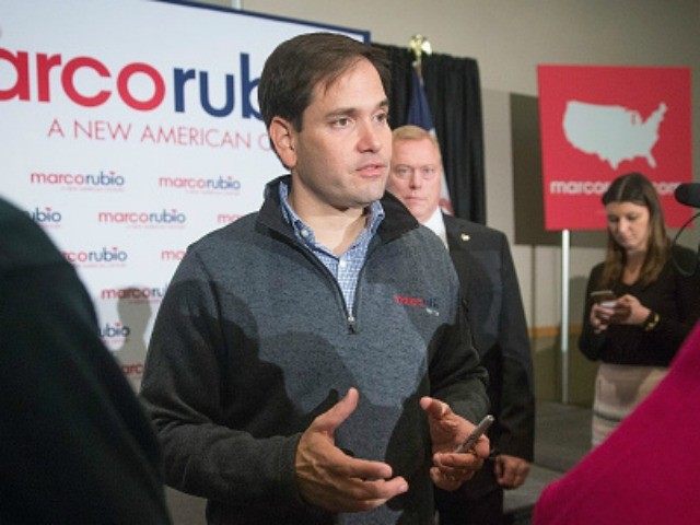 Republican presidential candidate Sen. Marco Rubio greets guests during a town hall meeting