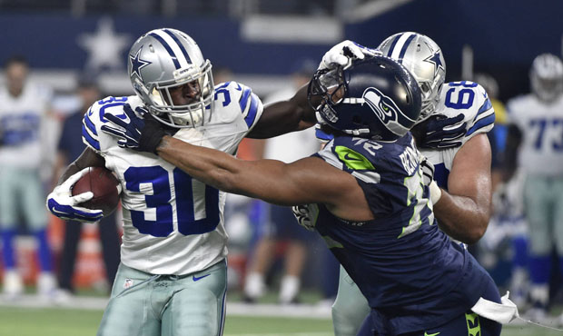 The Cowboys waived Christine Michael on Tuesday but still owe Seattle a draft pick for him