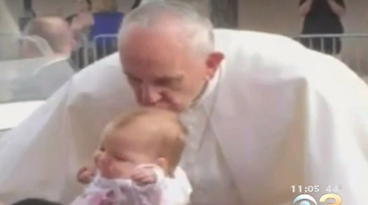 The moment Pope Francis kissed baby Gianna