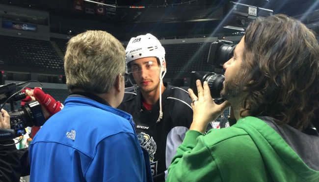 Tomas Jurco of the Detroit Red Wings talks with 24 Hour News 8's Larry Figurski during practice with the Grand Rapids Griffins