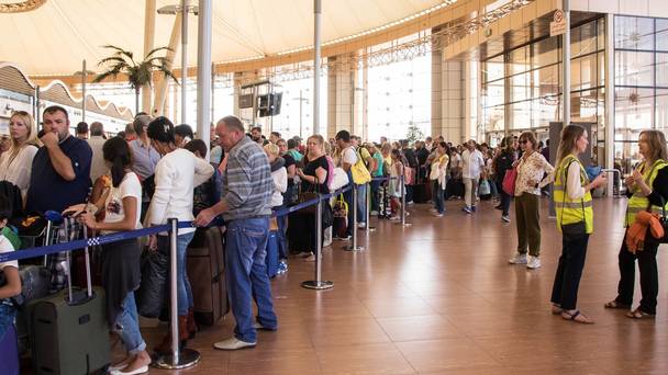 Tourists line up for luggage screening at Sharm el Sheikh airport