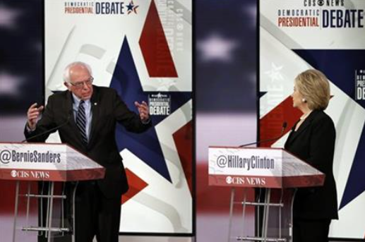 Bernie Sanders left makes a point as Hillary Rodham Clinton listens during a Democratic presidential primary debate Saturday Nov. 14 2015 in Des Moines Iowa