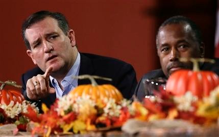 Republican presidential candidate Sen. Ted Cruz R Texas speaks during the Presidential Family Forum as Ben Carson listens Friday Nov. 20 2015 in Des Moines Iowa