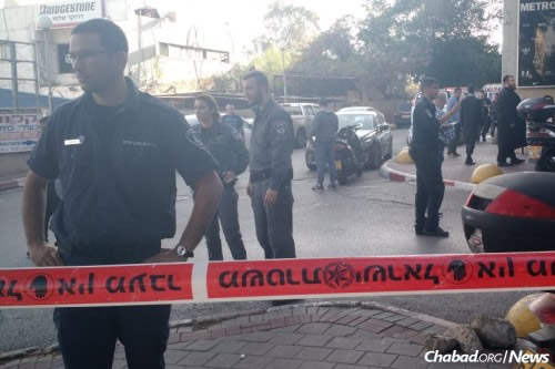 Two men were killed by a terrorist while leaving an afternoon prayer service in a Tel Aviv office building