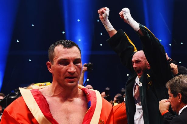 Tyson Fury beats heavyweight champ, serenades wife