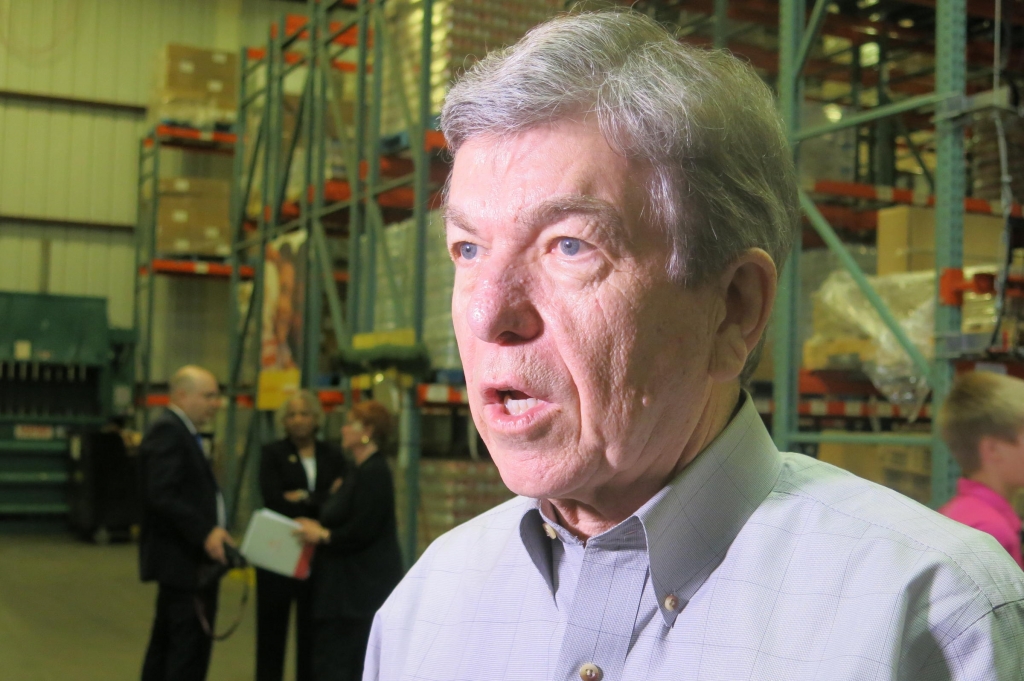 U.S. Sen. Roy Blunt discusses the Syrian refugee crisis during a stop at Harvesters the community food bank