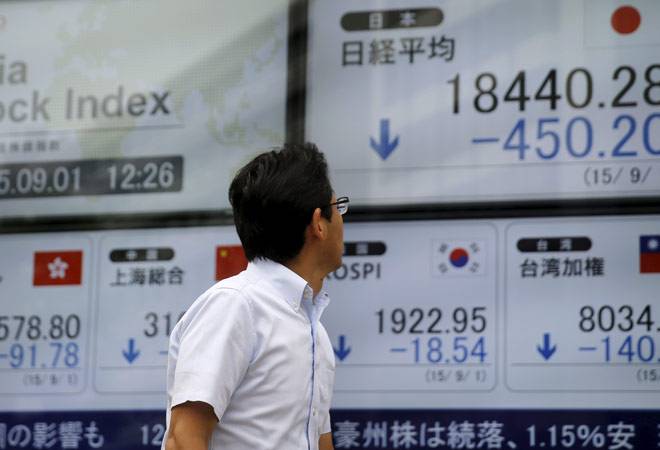 Asia shares firm as traders add to ECB stimulus bets