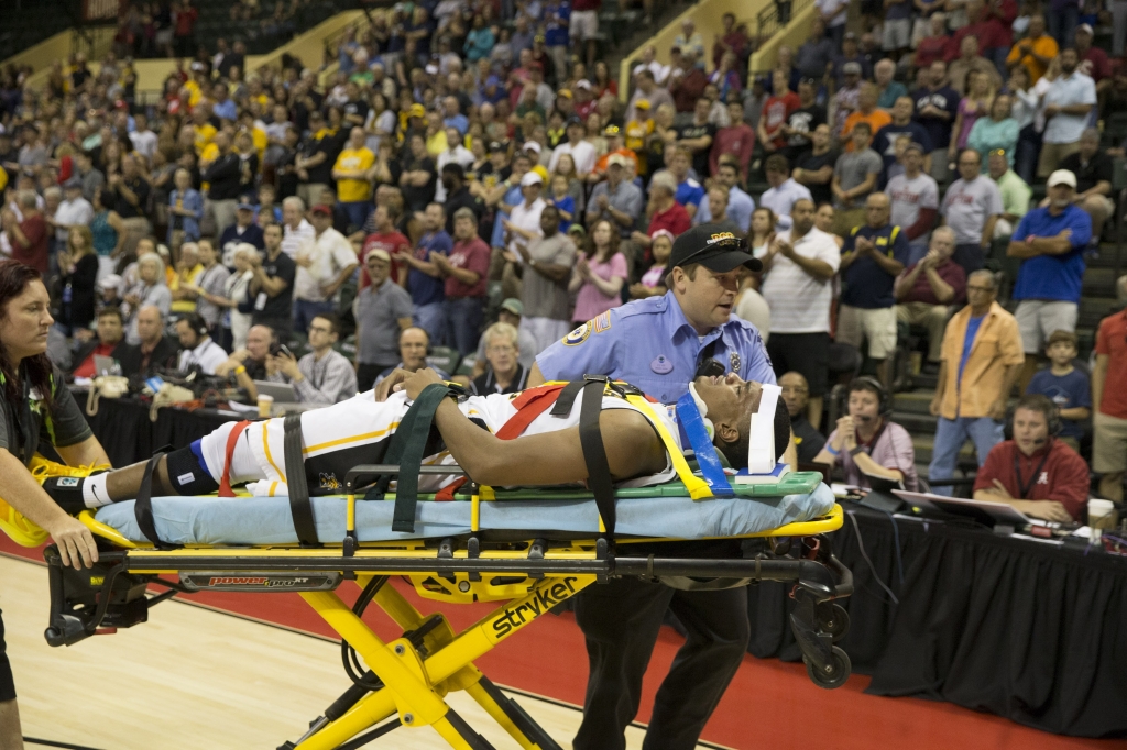 Wichita State forward Anton Grady is taken off the court after an injury during the second half of an NCAA college basketball game Friday Nov. 27 2015 in Orlando Fla. Alabama won 64-60