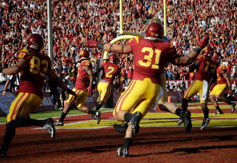 Southern California players celebrate a touchdown scored by cornerback Adoree Jackson during the first half of an NCAA college football game against UCLA Saturday Nov. 28 2015 in Los Angeles