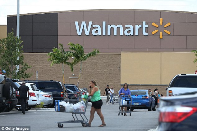 Wal-Mart Stores said it is offering most of the same Black Friday doorbuster deals online and in stores for the first time ever giving online shoppers an early jump on the sales. Above A Wal Mart in Miami