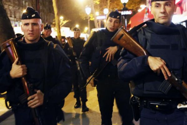 French police patrol at the place de