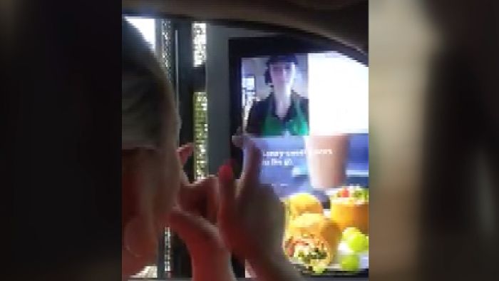 Video of deaf customer using sign language to order through new video drive-thru panel at Starbucks goes viral on Facebook