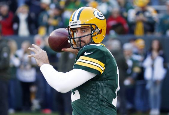 Green Bay Packers quarterback Aaron Rodgers warms up before an NFL football game against the Detroit Lions in Green Bay Wis. The physical toll of the long NFL season is catching up to Green Bay Pack