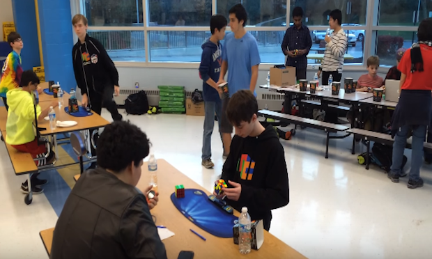 This 14-year-old just smashed the Rubik's Cube World Record in 4.90 seconds