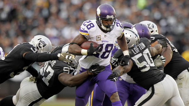 Peterson helps Vikings run past Raiders 30-14