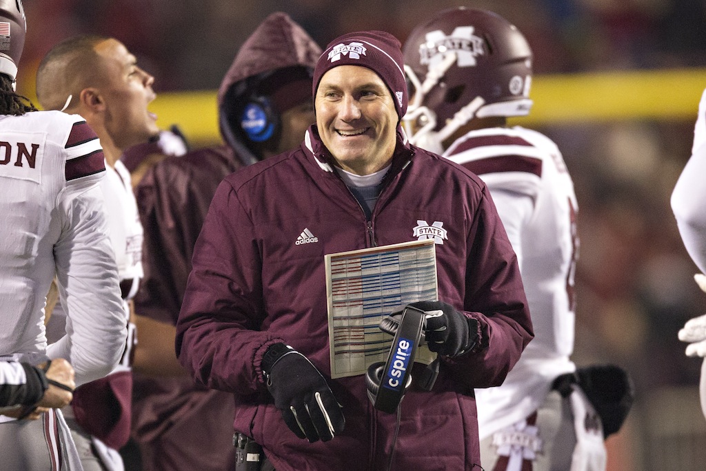 Dan Mullen smiles during Mississippi State's game against Arkansas