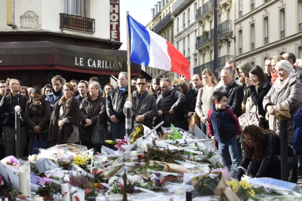 People observe a minute of silence