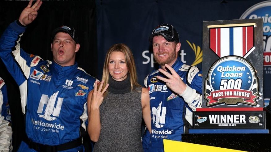 AVONDALE AZ- NOVEMBER 15  Amy Reimann celebrates with Dale Earnhardt Jr. driver of the #88 Nationwide Chevrolet in victory lane after Earnhardt won the rain-shortened NASCAR Sprint Cup Series Quicken Loans Race for Heroes 500 at Phoenix Internat