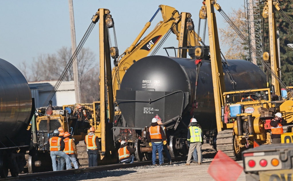 Crude oil leaks from derailed train cars in southern Wisconsin