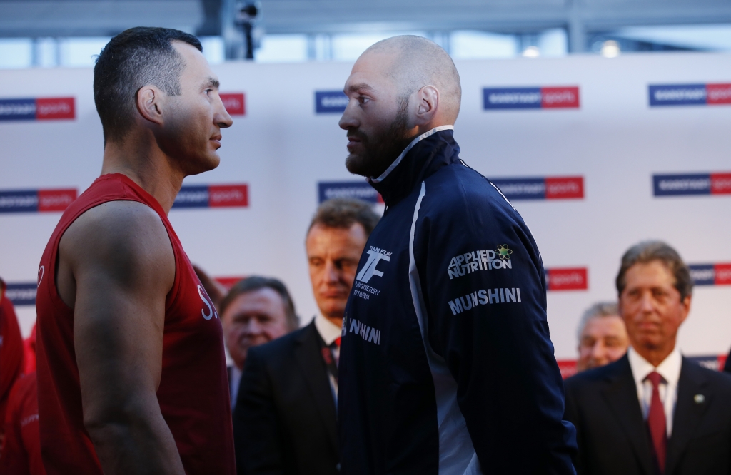 Wladimir Klitschko and Tyson Fury at the weigh-in before they contest the heavyweight world title