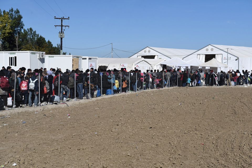 The Latest Thousands reach northern Greek border