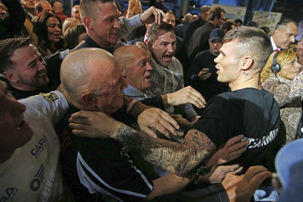 Murray right greets supporters before the weigh-in for his bout with Abraham
Andrew Couldridge  Reuters