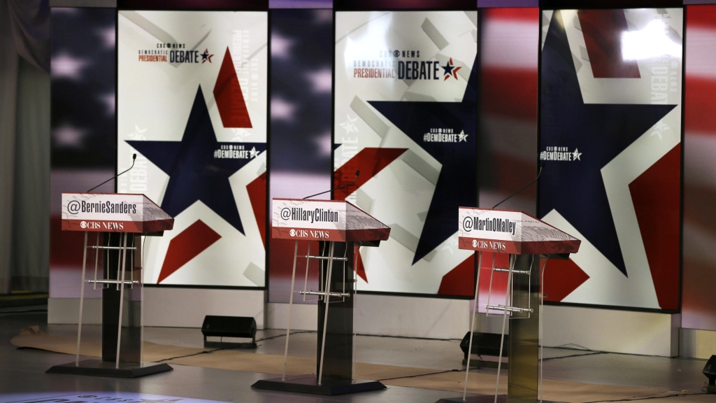 The podiums are seen on the stage during final preparations for Saturday night's Democratic presidential debate between Sen. Bernie Sanders I-Vt. Hillary Rodham Clinton and former Maryland Gov. Martin O'Malley in Des Moines Iowa