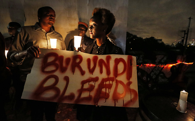 A Burundian expatriate attends a candlelight vigil held for Burundi in Nairobi Kenya earlier this month