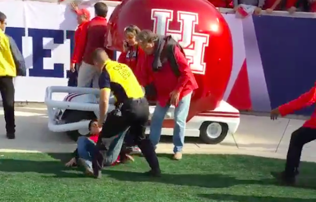 A Houston fan got dropped by security guard trying to rush the field