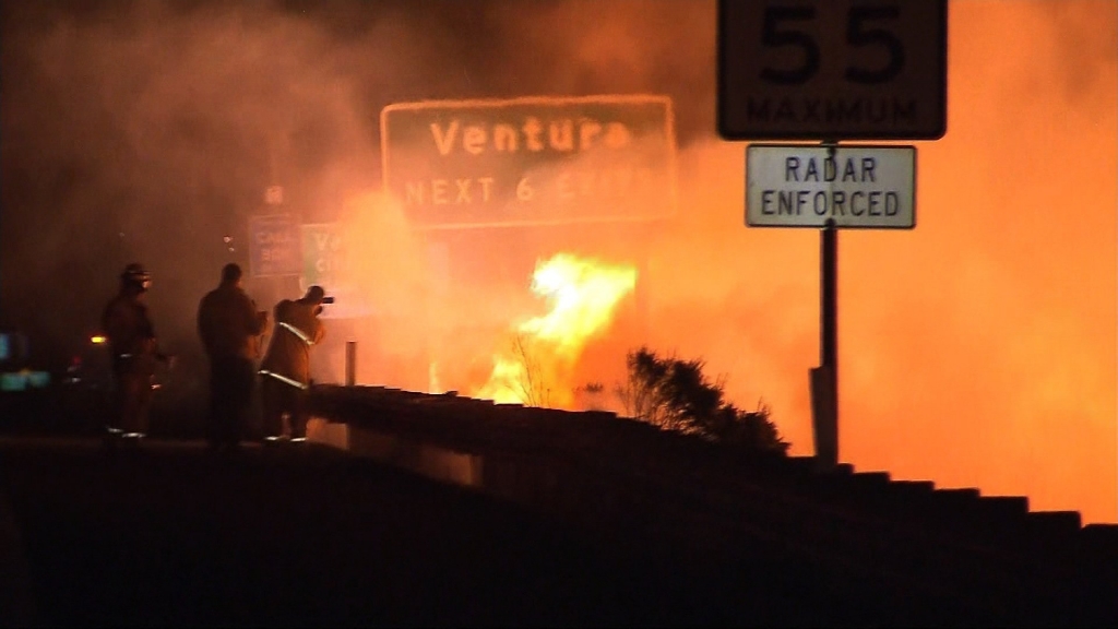 A grass fire is spreading out of control near Los Angeles