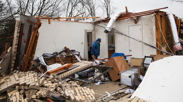 A heavily damaged residence is seen in the aftermath of a tornado in Rowlett Texas