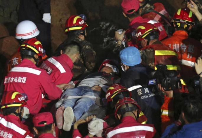 A man was found alive in the rubble 67 hours after the landslide in Shenzhen in China