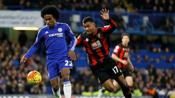 A midfield struggle for the ball with Chelsea's Willian